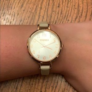 Tan/gold women’s watch